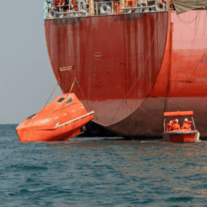 Lifeboat and davit launching test by OJ Safety under SOLAS III and MSC.402(96) in Baltic and Scandinavian ports. On-load release inspection, winch and brake testing for class acceptance.